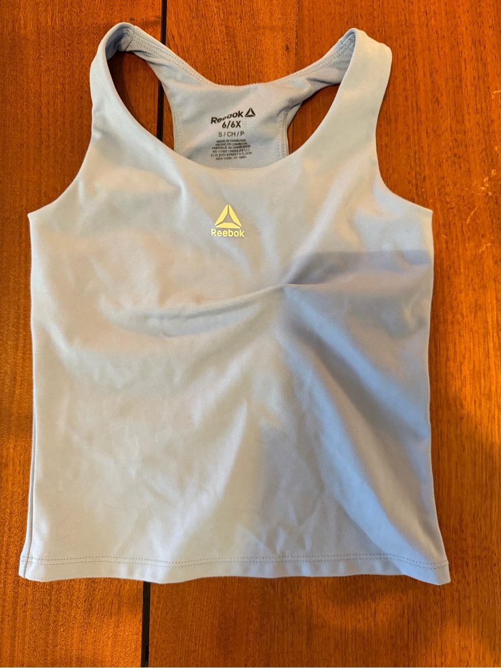 Reebok Light Blue Girls' Racerback Tank Top with Yellow Logo size 5/6